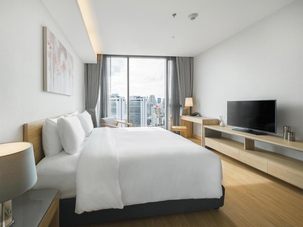Oakwood Suites Bangkok Ngoại thất bức ảnh Deluxe Room