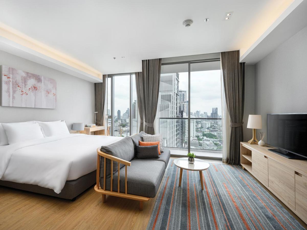 Oakwood Suites Bangkok Ngoại thất bức ảnh Deluxe Room