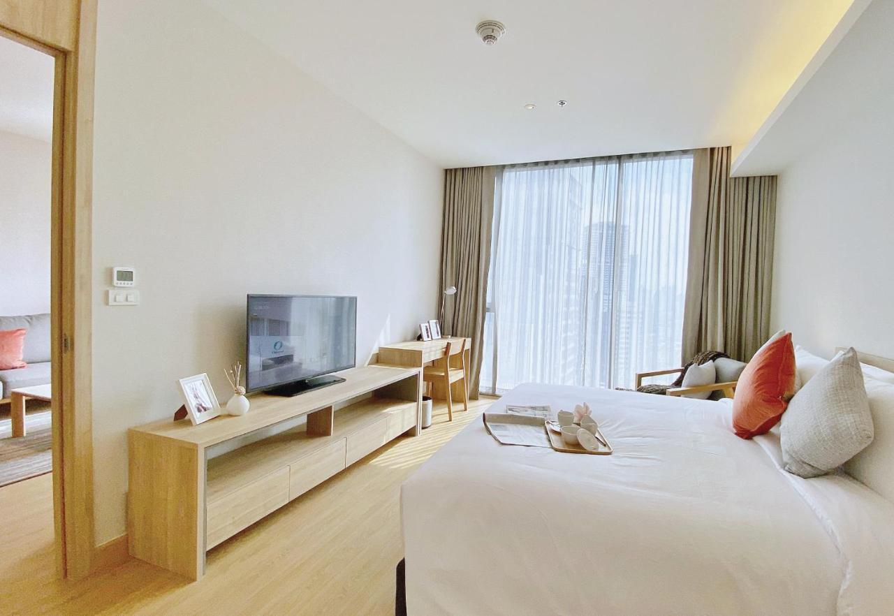 Oakwood Suites Bangkok Ngoại thất bức ảnh Deluxe Room
