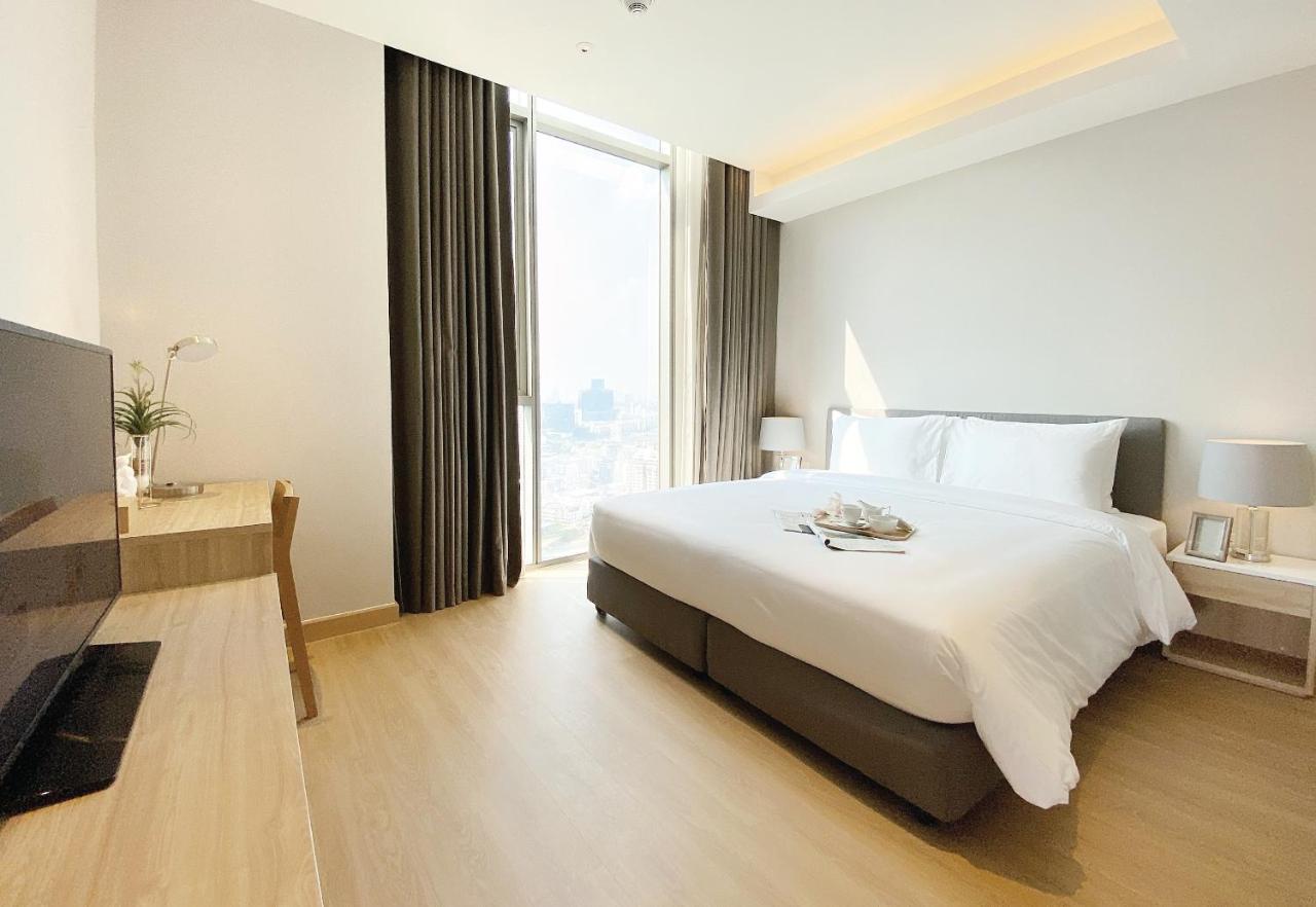 Oakwood Suites Bangkok Ngoại thất bức ảnh Deluxe Room